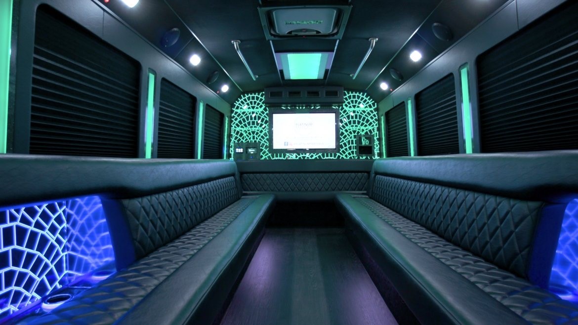 Party bus interior with LED lighting and seating