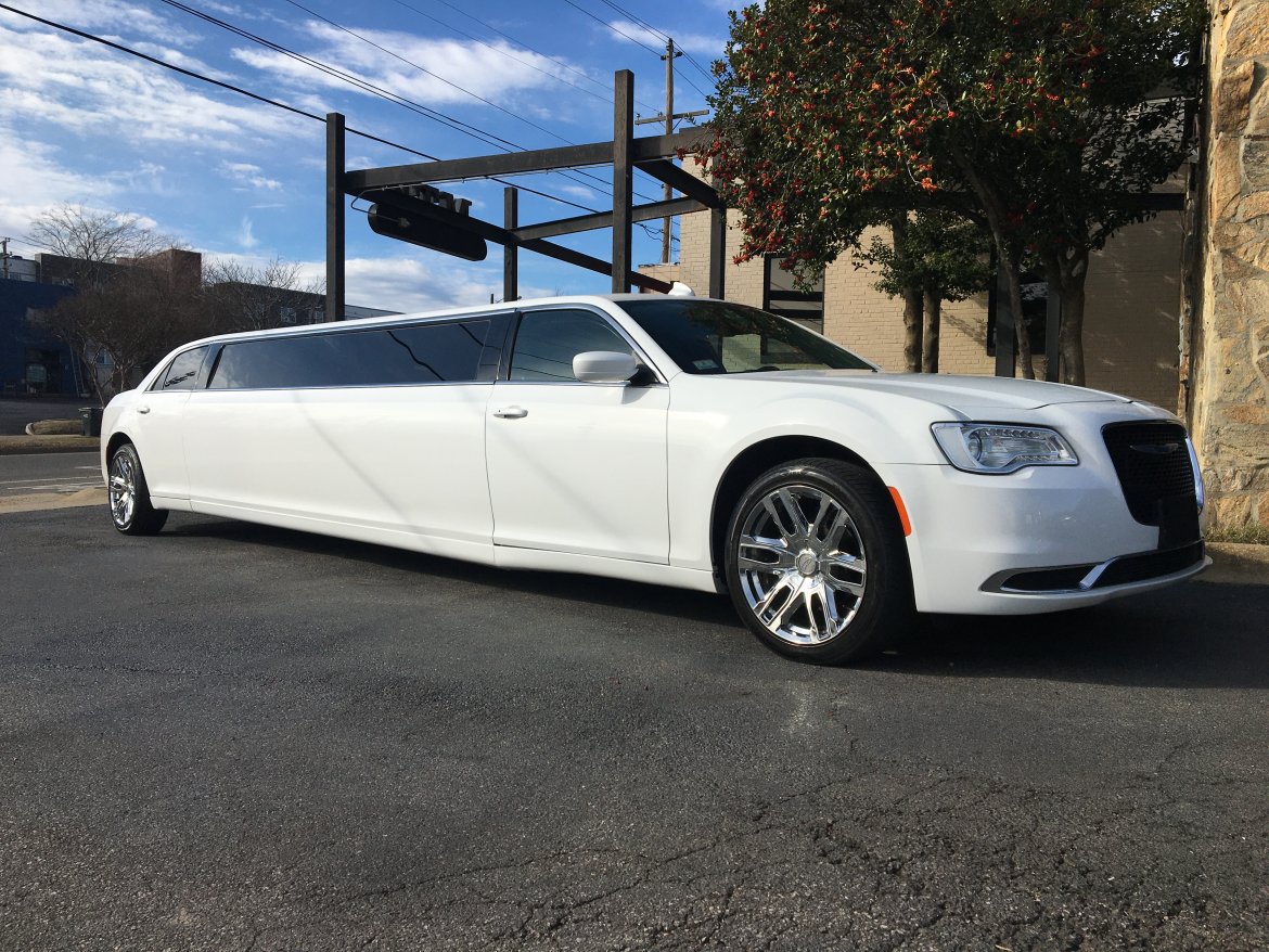 White limousine on city street